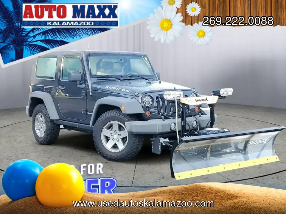 2010 Gray /Dark Khaki/Medium Khaki Jeep Wrangler Rubicon (1J4BA6D15AL) with an V6, 3.8L engine, 4-speed automatic transmission, located at 6064 Gull Rd, Kalamazoo, MI, 49048, (269) 222-0088, 42.328388, -85.512924 - Adventure awaits with our remarkable 2010 Jeep Wrangler Rubicon 4WD, a vehicle that embodies freedom and exploration. Whether you're looking to tackle rugged terrains on weekend getaways or navigate the urban jungle with style, this SUV is your perfect companion. With its iconic design and robust fe - Photo#0