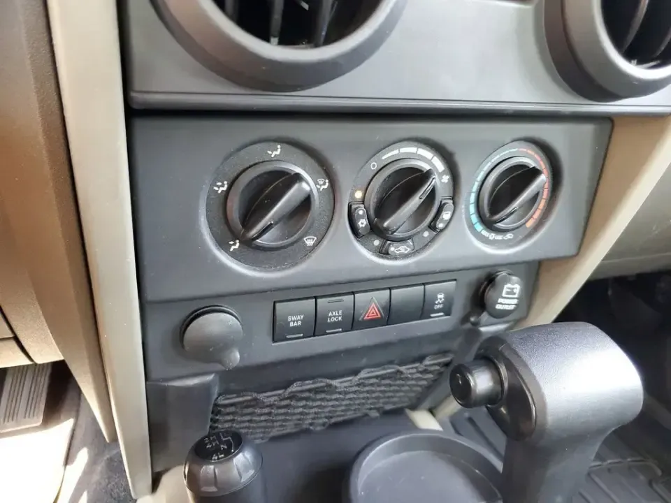 2010 Gray /Dark Khaki/Medium Khaki Jeep Wrangler Rubicon (1J4BA6D15AL) with an V6, 3.8L engine, 4-speed automatic transmission, located at 6064 Gull Rd, Kalamazoo, MI, 49048, (269) 222-0088, 42.328388, -85.512924 - Adventure awaits with our remarkable 2010 Jeep Wrangler Rubicon 4WD, a vehicle that embodies freedom and exploration. Whether you're looking to tackle rugged terrains on weekend getaways or navigate the urban jungle with style, this SUV is your perfect companion. With its iconic design and robust fe - Photo#18