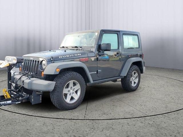 2010 Dark Charcoal /Dark Khaki/Medium Khaki Jeep Wrangler Rubicon (1J4BA6D15AL) with an 3.8L V6 SMPI engine, Automatic transmission, located at 6064 Gull Rd, Kalamazoo, MI, 49048, (269) 222-0088, 42.328388, -85.512924- Photo#1