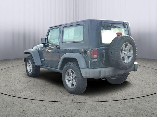 2010 Dark Charcoal /Dark Khaki/Medium Khaki Jeep Wrangler Rubicon (1J4BA6D15AL) with an 3.8L V6 SMPI engine, Automatic transmission, located at 6064 Gull Rd, Kalamazoo, MI, 49048, (269) 222-0088, 42.328388, -85.512924- Photo#2