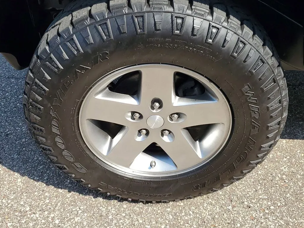 2010 Gray /Dark Khaki/Medium Khaki Jeep Wrangler Rubicon (1J4BA6D15AL) with an V6, 3.8L engine, 4-speed automatic transmission, located at 6064 Gull Rd, Kalamazoo, MI, 49048, (269) 222-0088, 42.328388, -85.512924 - Adventure awaits with our remarkable 2010 Jeep Wrangler Rubicon 4WD, a vehicle that embodies freedom and exploration. Whether you're looking to tackle rugged terrains on weekend getaways or navigate the urban jungle with style, this SUV is your perfect companion. With its iconic design and robust fe - Photo#7