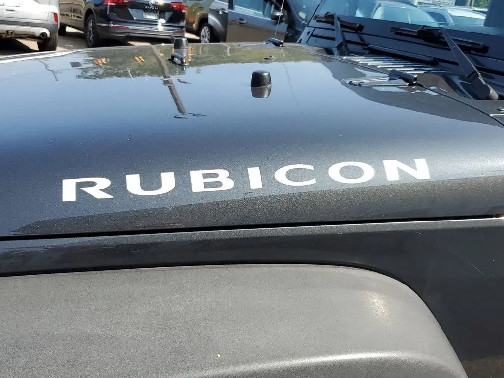 2010 Gray /Dark Khaki/Medium Khaki Jeep Wrangler Rubicon (1J4BA6D15AL) with an V6, 3.8L engine, 4-speed automatic transmission, located at 6064 Gull Rd, Kalamazoo, MI, 49048, (269) 222-0088, 42.328388, -85.512924 - Adventure awaits with our remarkable 2010 Jeep Wrangler Rubicon 4WD, a vehicle that embodies freedom and exploration. Whether you're looking to tackle rugged terrains on weekend getaways or navigate the urban jungle with style, this SUV is your perfect companion. With its iconic design and robust fe - Photo#8