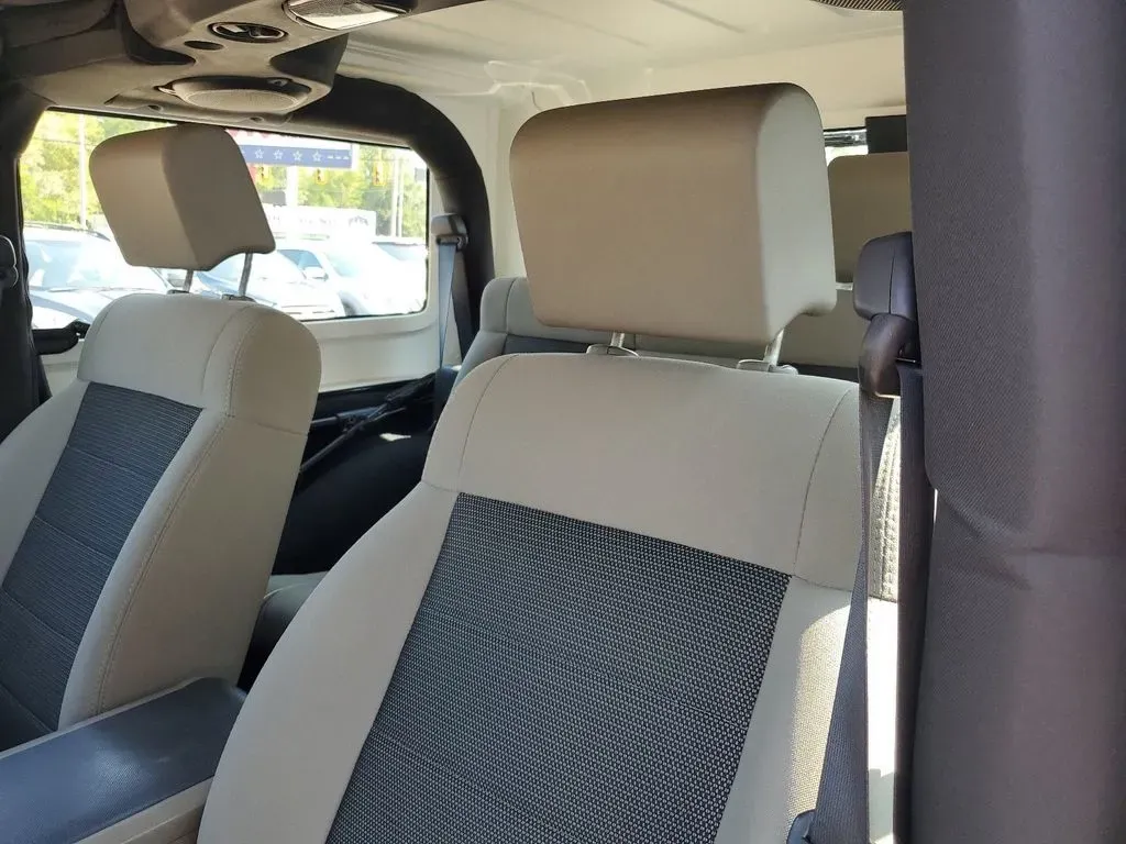 2010 Gray /Dark Khaki/Medium Khaki Jeep Wrangler Rubicon (1J4BA6D15AL) with an V6, 3.8L engine, 4-speed automatic transmission, located at 6064 Gull Rd, Kalamazoo, MI, 49048, (269) 222-0088, 42.328388, -85.512924 - Adventure awaits with our remarkable 2010 Jeep Wrangler Rubicon 4WD, a vehicle that embodies freedom and exploration. Whether you're looking to tackle rugged terrains on weekend getaways or navigate the urban jungle with style, this SUV is your perfect companion. With its iconic design and robust fe - Photo#12