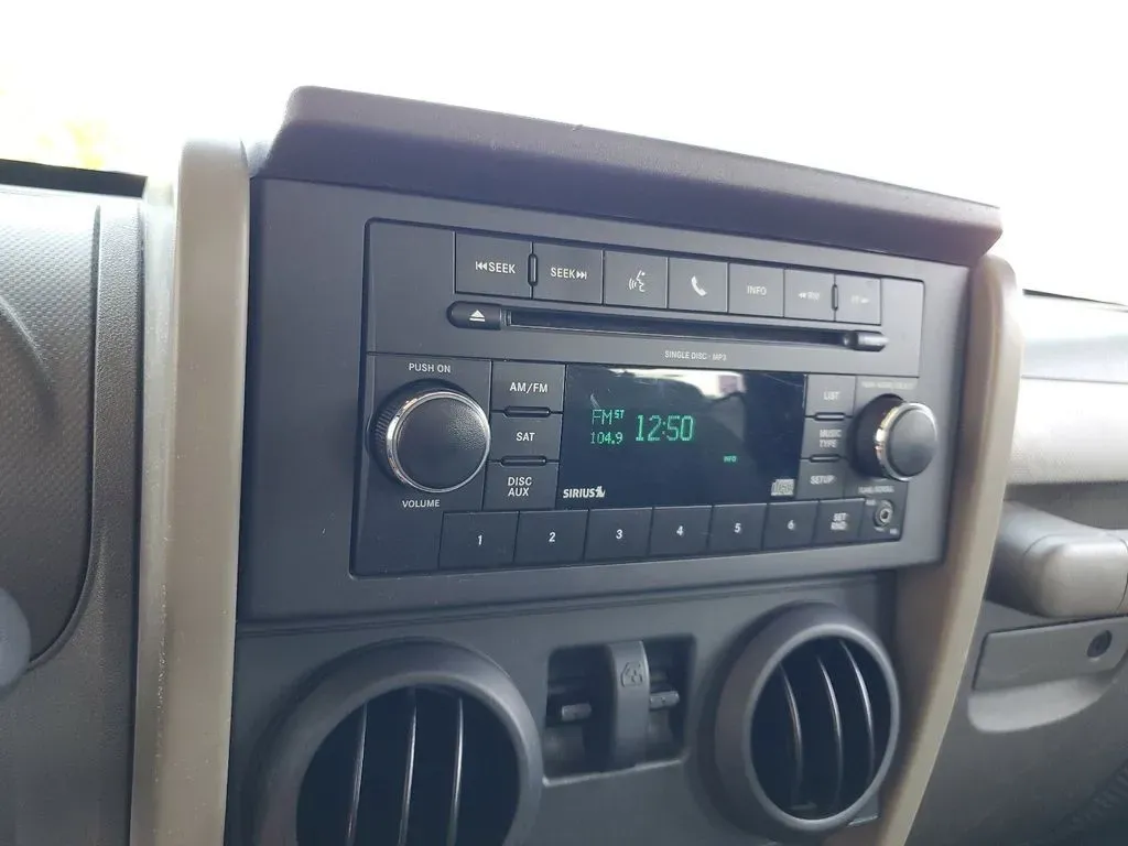 2010 Gray /Dark Khaki/Medium Khaki Jeep Wrangler Rubicon (1J4BA6D15AL) with an V6, 3.8L engine, 4-speed automatic transmission, located at 6064 Gull Rd, Kalamazoo, MI, 49048, (269) 222-0088, 42.328388, -85.512924 - Adventure awaits with our remarkable 2010 Jeep Wrangler Rubicon 4WD, a vehicle that embodies freedom and exploration. Whether you're looking to tackle rugged terrains on weekend getaways or navigate the urban jungle with style, this SUV is your perfect companion. With its iconic design and robust fe - Photo#18