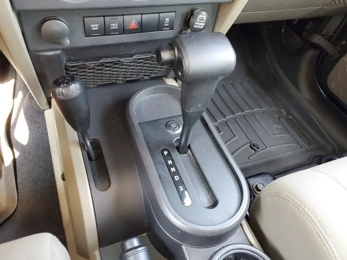 2010 Gray /Dark Khaki/Medium Khaki Jeep Wrangler Rubicon (1J4BA6D15AL) with an V6, 3.8L engine, 4-speed automatic transmission, located at 6064 Gull Rd, Kalamazoo, MI, 49048, (269) 222-0088, 42.328388, -85.512924 - Adventure awaits with our remarkable 2010 Jeep Wrangler Rubicon 4WD, a vehicle that embodies freedom and exploration. Whether you're looking to tackle rugged terrains on weekend getaways or navigate the urban jungle with style, this SUV is your perfect companion. With its iconic design and robust fe - Photo#20