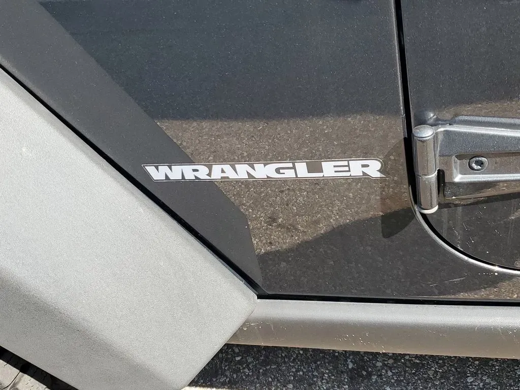 2010 Gray /Dark Khaki/Medium Khaki Jeep Wrangler Rubicon (1J4BA6D15AL) with an V6, 3.8L engine, 4-speed automatic transmission, located at 6064 Gull Rd, Kalamazoo, MI, 49048, (269) 222-0088, 42.328388, -85.512924 - Adventure awaits with our remarkable 2010 Jeep Wrangler Rubicon 4WD, a vehicle that embodies freedom and exploration. Whether you're looking to tackle rugged terrains on weekend getaways or navigate the urban jungle with style, this SUV is your perfect companion. With its iconic design and robust fe - Photo#22