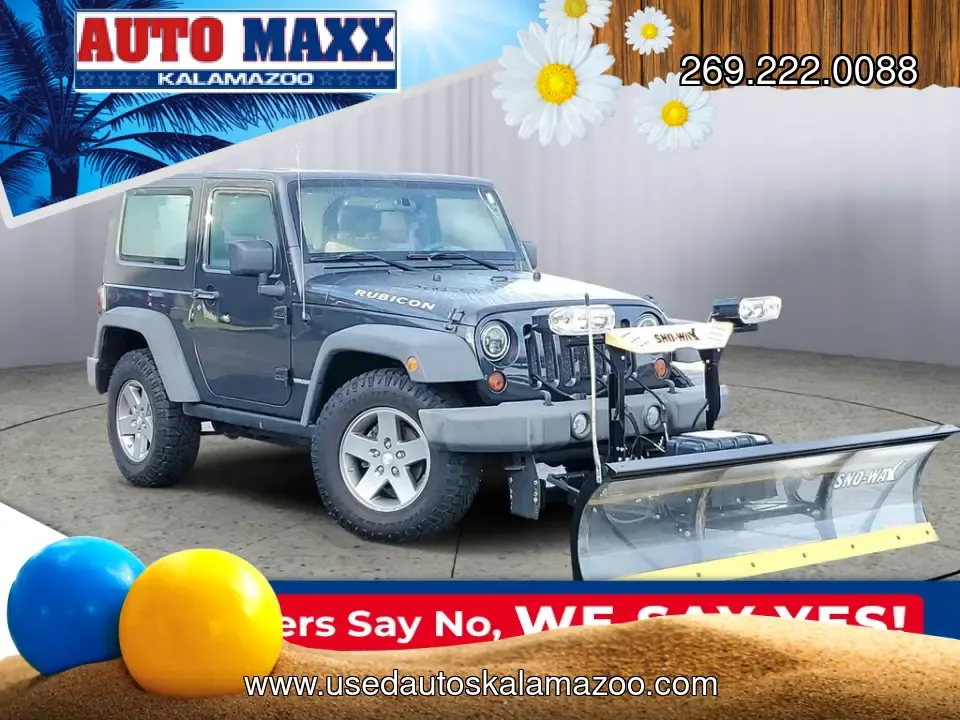 2010 Dark Charcoal /Dark Khaki/Medium Khaki Jeep Wrangler Rubicon (1J4BA6D15AL) with an 3.8L V6 SMPI engine, Automatic transmission, located at 6064 Gull Rd, Kalamazoo, MI, 49048, (269) 222-0088, 42.328388, -85.512924- Photo#22