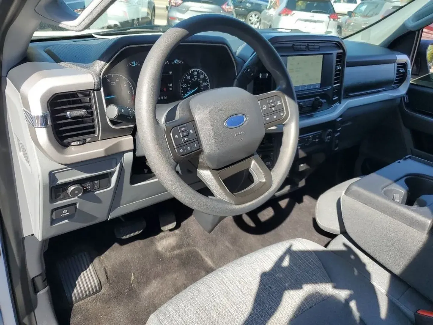2021 Oxford White /Black/Medium Dark Slate Ford F-150 XLT (1FTFW1E83MF) with an V6, 3.5L engine, 10-speed automatic transmission, located at 6064 Gull Rd, Kalamazoo, MI, 49048, (269) 222-0088, 42.328388, -85.512924 - <b>Vehicle Details</b><br>Discover the power and sophistication of this 2021 Ford F-150 XLT, a true embodiment of strength and style! This exceptional truck, equipped with a robust V6, 3.5L engine, and 4WD, promises an exhilarating driving experience, whether you're conquering rugged terrains or cru - Photo#12