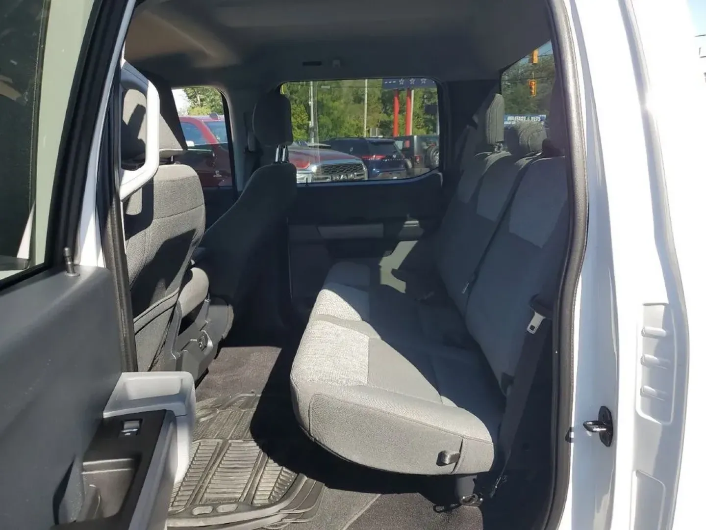 2021 Oxford White /Black/Medium Dark Slate Ford F-150 XLT (1FTFW1E83MF) with an V6, 3.5L engine, 10-speed automatic transmission, located at 6064 Gull Rd, Kalamazoo, MI, 49048, (269) 222-0088, 42.328388, -85.512924 - <b>Vehicle Details</b><br>Discover the power and sophistication of this 2021 Ford F-150 XLT, a true embodiment of strength and style! This exceptional truck, equipped with a robust V6, 3.5L engine, and 4WD, promises an exhilarating driving experience, whether you're conquering rugged terrains or cru - Photo#26