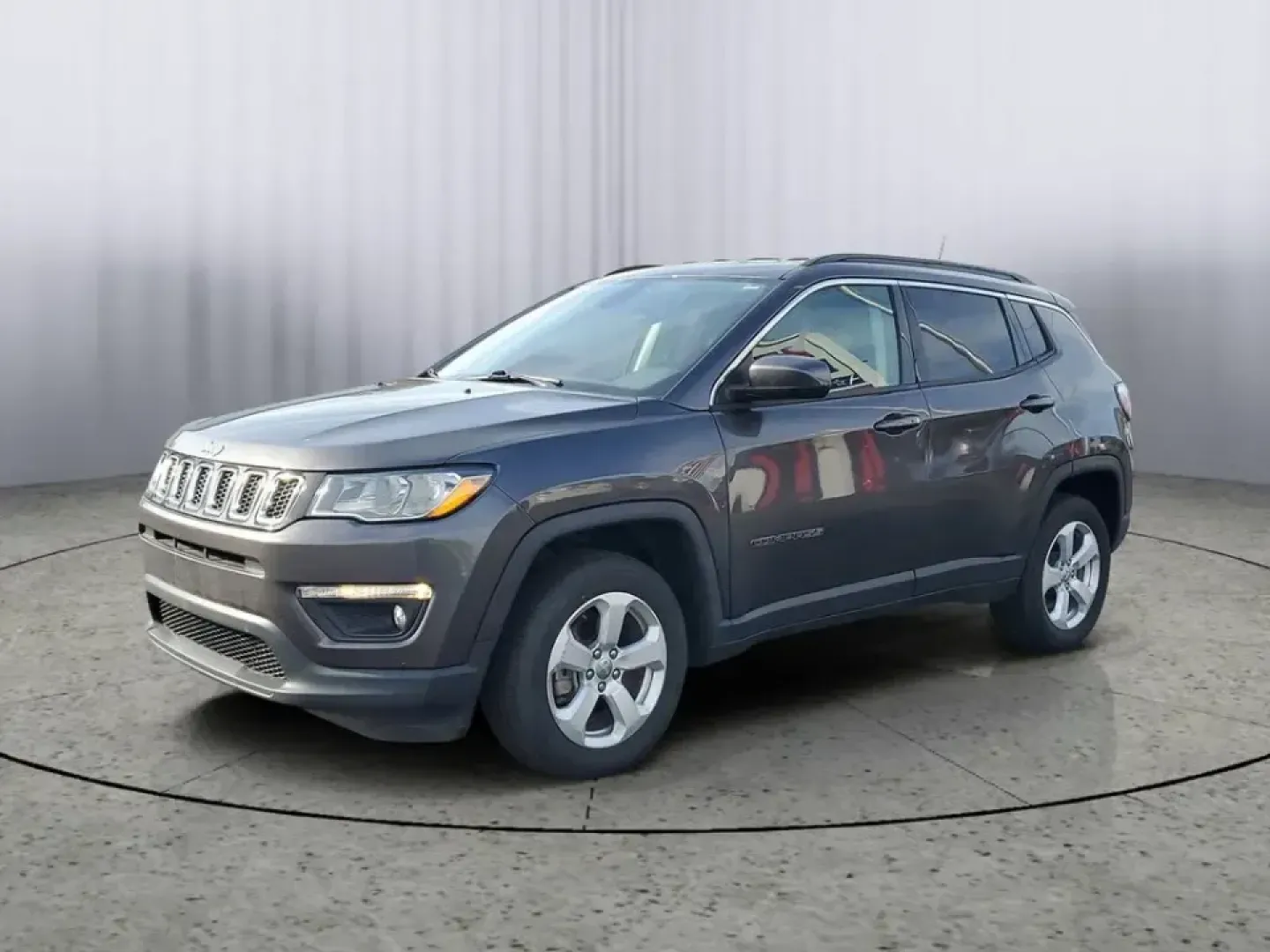 2020 Granite Crystal Metallic Clearcoat /Black Jeep Compass Latitude (3C4NJDBB5LT) with an 4 Cyl, 2.4L engine, 9-speed automatic transmission, located at 6064 Gull Rd, Kalamazoo, MI, 49048, (269) 222-0088, 42.328388, -85.512924 - Discover Adventure with the 2020 Jeep Compass Latitude 4WD Perfect for Your Next Journey!<br /> <br /> Are you ready to embrace new adventures while enjoying the comfort of a reliable SUV? Look no further than this stunning 2020 Jeep Compass Latitude 4WD, now available at AutoMaxx - Kalamazoo. Loca - Photo#1