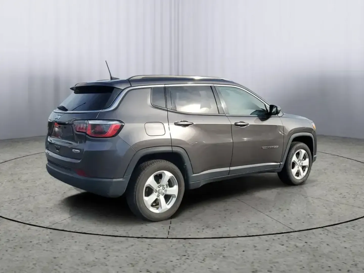 2020 Granite Crystal Metallic Clearcoat /Black Jeep Compass Latitude (3C4NJDBB5LT) with an 4 Cyl, 2.4L engine, 9-speed automatic transmission, located at 6064 Gull Rd, Kalamazoo, MI, 49048, (269) 222-0088, 42.328388, -85.512924 - Discover Adventure with the 2020 Jeep Compass Latitude 4WD Perfect for Your Next Journey!<br /> <br /> Are you ready to embrace new adventures while enjoying the comfort of a reliable SUV? Look no further than this stunning 2020 Jeep Compass Latitude 4WD, now available at AutoMaxx - Kalamazoo. Loca - Photo#3