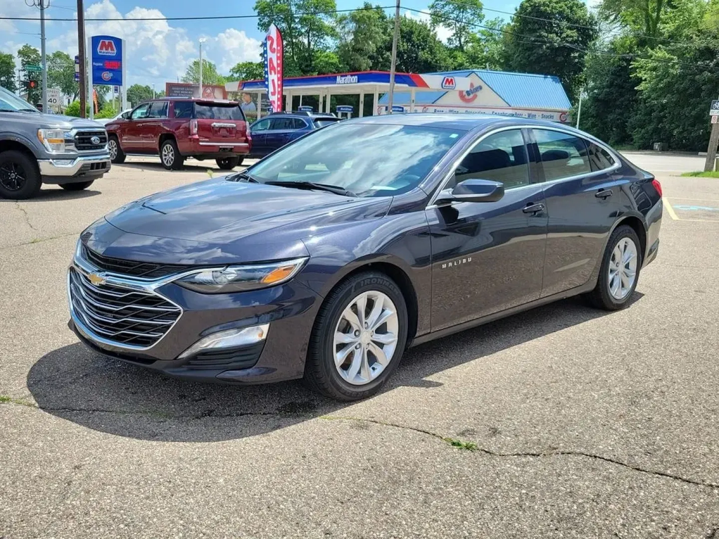 2023 Dark Ash Metallic /Jet Black Chevrolet Malibu LT (1G1ZD5ST2PF) with an 4 Cyl, 1.5L engine, CVT transmission, located at 6064 Gull Rd, Kalamazoo, MI, 49048, (269) 222-0088, 42.328388, -85.512924 - **Experience the Perfect Blend of Style and Comfort with the 2023 Chevrolet Malibu** <br /> <br /> If you're searching for a vehicle that seamlessly fits into your busy lifestyle, look no further than this stunning 2023 Chevrolet Malibu, now available at AutoMaxx - Battle Creek. This sleek sedan is - Photo#2
