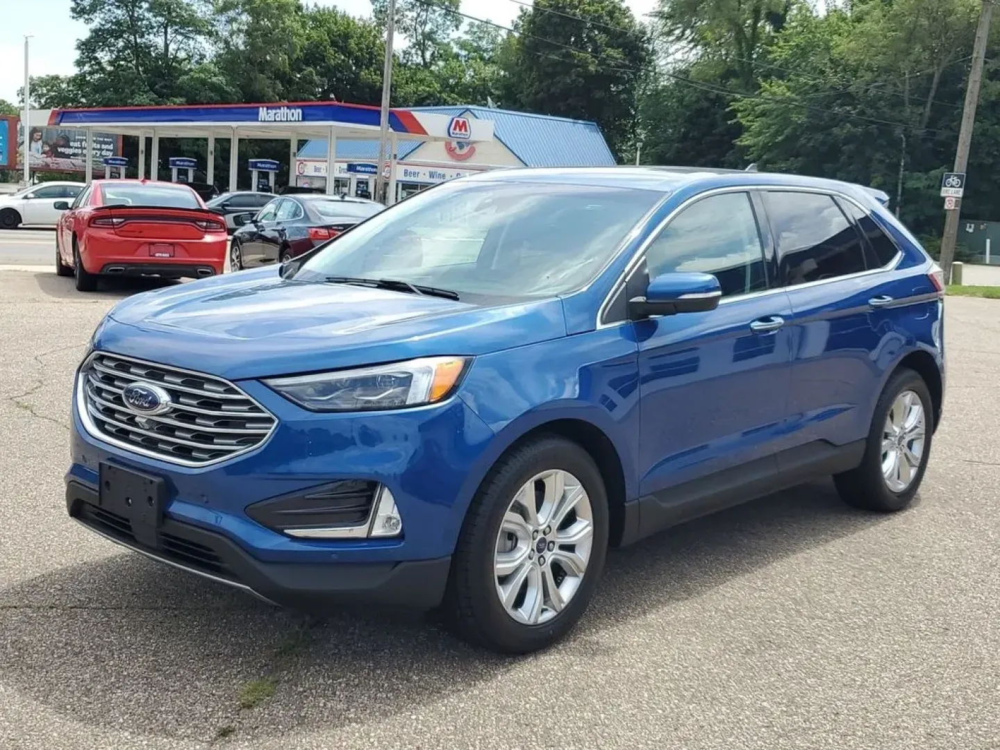 2022 Atlas Blue Metallic /Ebony Ford Edge Titanium (2FMPK4K95NB) with an 4 Cyl, 2.0L engine, 8-speed automatic transmission, located at 6064 Gull Rd, Kalamazoo, MI, 49048, (269) 222-0088, 42.328388, -85.512924 - **Discover the 2022 Ford Edge Titanium: Your Ideal SUV for Family Adventures and Daily Commutes!**<br /> <br /> Are you searching for the perfect balance of style, comfort, and capability? Look no further than this stunning 2022 Ford Edge Titanium, available now at AutoMaxx - Battle Creek! Whether y - Photo#3