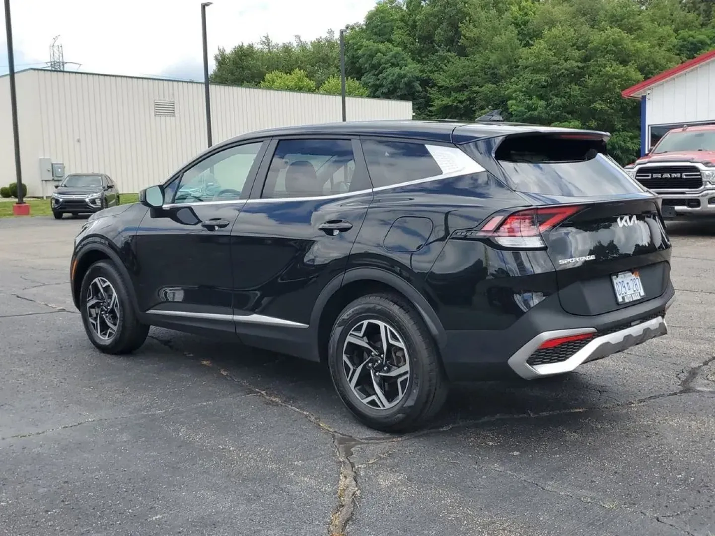 2024 Fusion Black /BLACK Kia Sportage LX (KNDPUCDFXR7) with an 4 Cyl, 2.5L engine, 8-speed automatic transmission, located at 6064 Gull Rd, Kalamazoo, MI, 49048, (269) 222-0088, 42.328388, -85.512924 - Discover the perfect blend of style, performance, and technology with this pre-owned 2024 Kia Sportage LX featuring AWD. This versatile SUV is equipped with a robust 4-cylinder, 2.5L engine, ensuring a dynamic driving experience coupled with impressive fuel efficiency. The Kia Sportage LX is designe - Photo#3