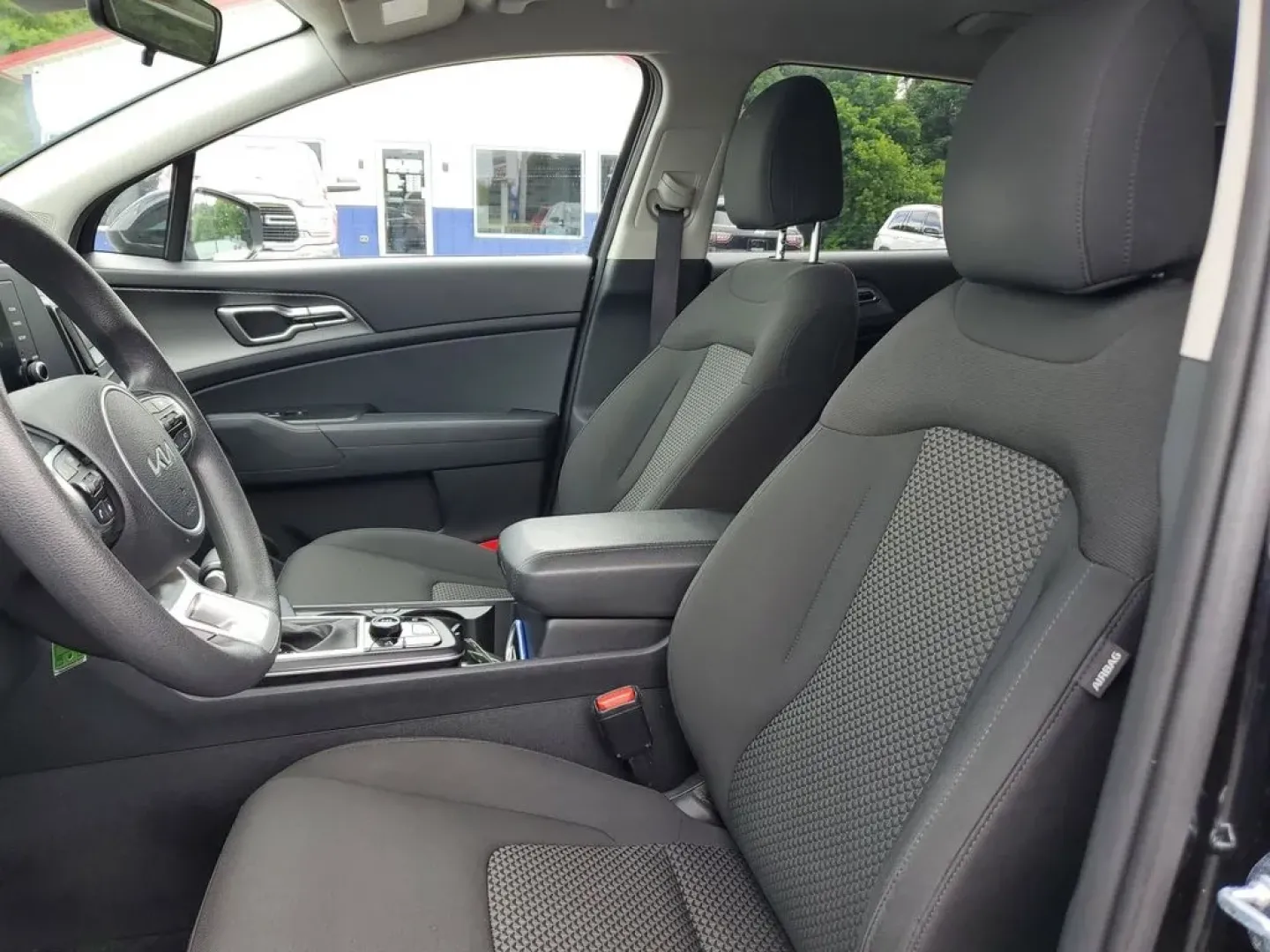 2024 Fusion Black /BLACK Kia Sportage LX (KNDPUCDFXR7) with an 4 Cyl, 2.5L engine, 8-speed automatic transmission, located at 6064 Gull Rd, Kalamazoo, MI, 49048, (269) 222-0088, 42.328388, -85.512924 - Discover the perfect blend of style, performance, and technology with this pre-owned 2024 Kia Sportage LX featuring AWD. This versatile SUV is equipped with a robust 4-cylinder, 2.5L engine, ensuring a dynamic driving experience coupled with impressive fuel efficiency. The Kia Sportage LX is designe - Photo#12