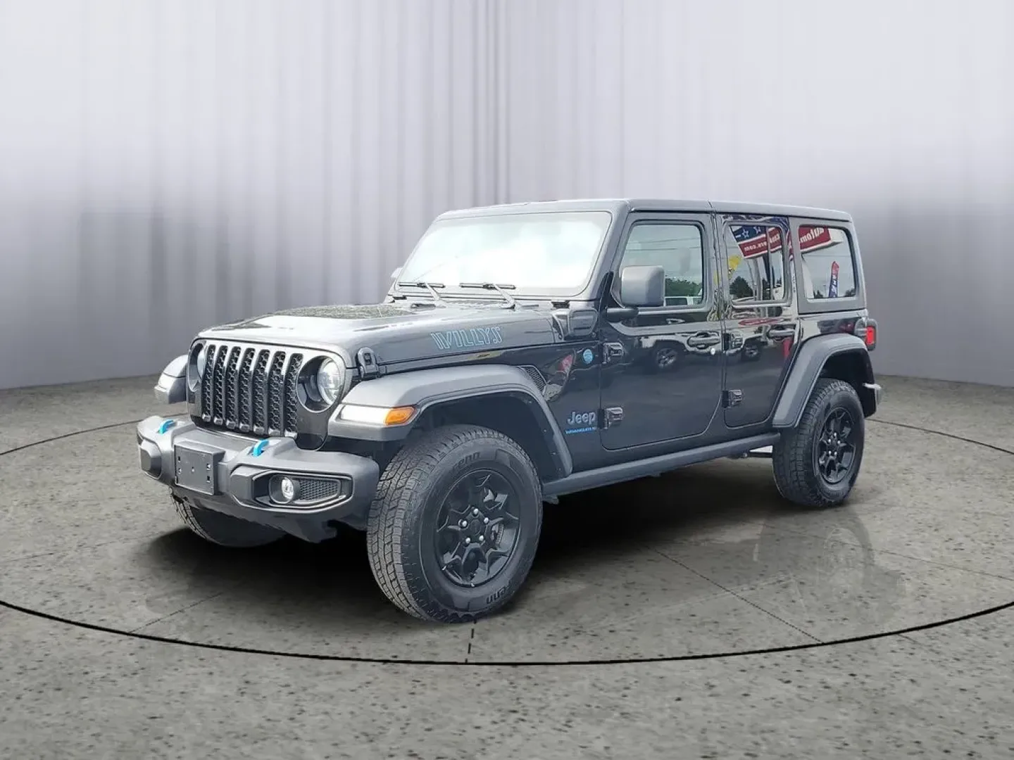 2023 BLACK /Black Jeep Wrangler Willys 4xe (1C4JJXN68PW) with an 4 Cyl, 2.0L engine, Automatic transmission, located at 6064 Gull Rd, Kalamazoo, MI, 49048, (269) 222-0088, 42.328388, -85.512924 - **Unleash Your Adventurous Spirit with the 2023 Jeep Wrangler Unlimited High Altitude 4XE!**<br /> <br /> Are you ready to take your weekend adventures to the next level? Look no further than this stunning 2023 Jeep Wrangler Unlimited High Altitude 4XE, now available at AutoMaxx Kalamazoo. With its - Photo#2