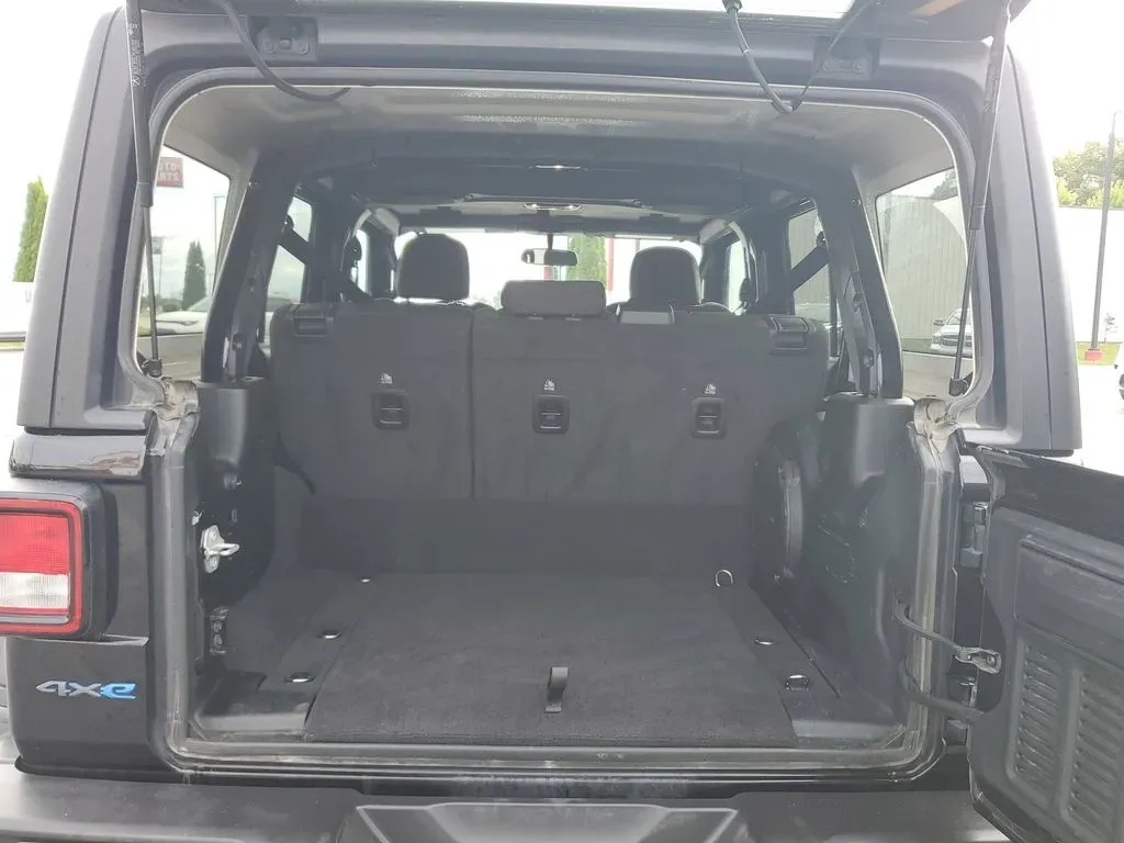 2023 BLACK /Black Jeep Wrangler Willys 4xe (1C4JJXN68PW) with an 4 Cyl, 2.0L engine, Automatic transmission, located at 6064 Gull Rd, Kalamazoo, MI, 49048, (269) 222-0088, 42.328388, -85.512924 - **Unleash Your Adventurous Spirit with the 2023 Jeep Wrangler Unlimited High Altitude 4XE!**<br /> <br /> Are you ready to take your weekend adventures to the next level? Look no further than this stunning 2023 Jeep Wrangler Unlimited High Altitude 4XE, now available at AutoMaxx Kalamazoo. With its - Photo#8