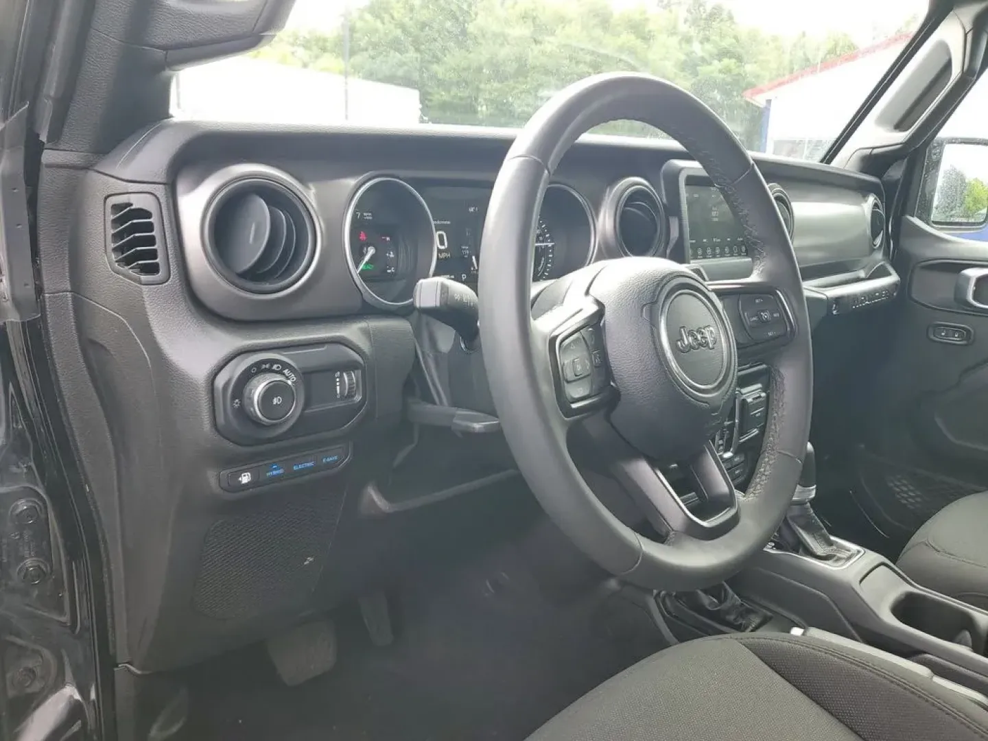 2023 BLACK /Black Jeep Wrangler Willys 4xe (1C4JJXN68PW) with an 4 Cyl, 2.0L engine, Automatic transmission, located at 6064 Gull Rd, Kalamazoo, MI, 49048, (269) 222-0088, 42.328388, -85.512924 - **Unleash Your Adventurous Spirit with the 2023 Jeep Wrangler Unlimited High Altitude 4XE!**<br /> <br /> Are you ready to take your weekend adventures to the next level? Look no further than this stunning 2023 Jeep Wrangler Unlimited High Altitude 4XE, now available at AutoMaxx Kalamazoo. With its - Photo#16