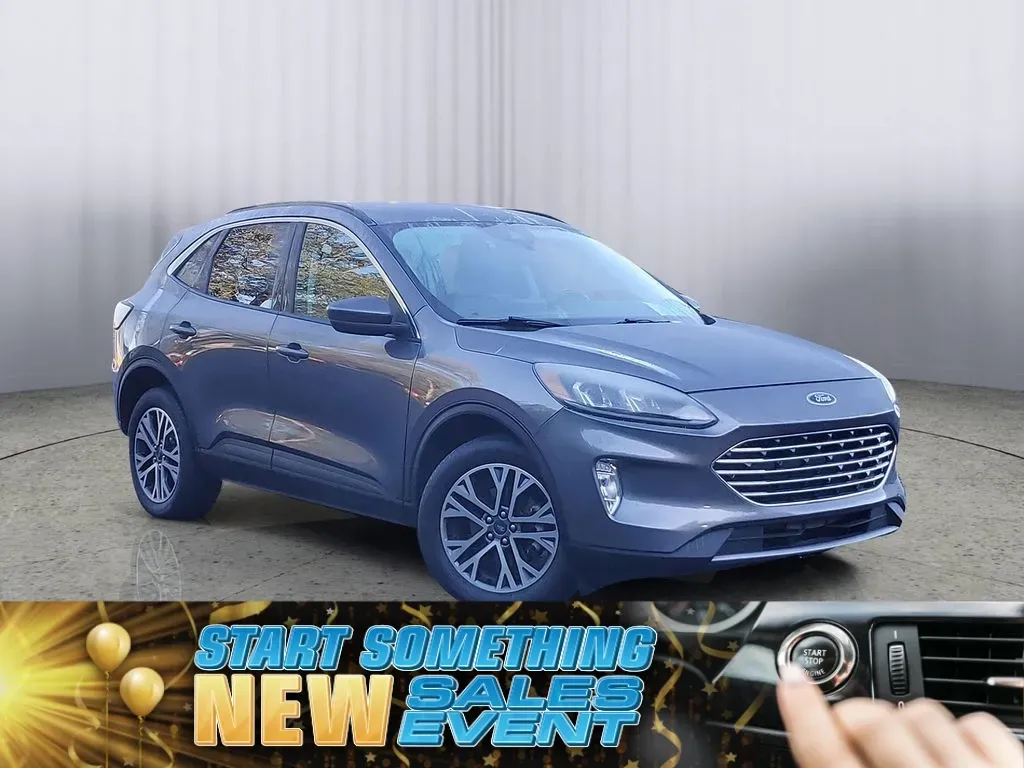 2021 /Ebony Ford Escape SEL (1FMCU9H6XMU) with an 3 Cyl, 1.5L engine, 8-speed automatic transmission, located at 6064 Gull Rd, Kalamazoo, MI, 49048, (269) 222-0088, 42.328388, -85.512924 - Unlock a world of adventure with the 2021 Ford Escape SEL, the perfect SUV for your busy lifestyle and family needs! Whether you're navigating daily commutes, embarking on weekend getaways, or tackling off-road excursions, this versatile vehicle combines style, comfort, and cutting-edge technology. - Photo#0