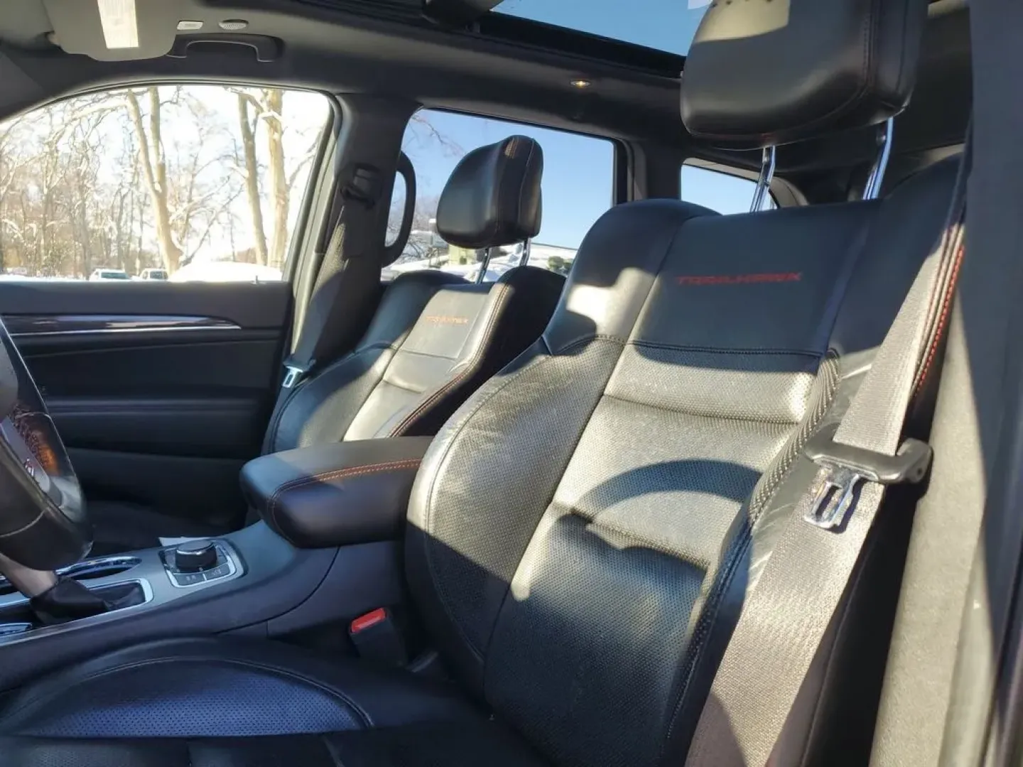 2021 /Black w/Ruby Red Accent Stitching Jeep Grand Cherokee Trailhawk (1C4RJFLG7MC) with an V6, 3.6L engine, 8-speed automatic transmission, located at 6064 Gull Rd, Kalamazoo, MI, 49048, (269) 222-0088, 42.328388, -85.512924 - **Conquer the Roads with the 2021 Jeep Grand Cherokee Trailhawk at AutoMaxx - Kalamazoo!**<br /> <br /> Are you ready to elevate your adventures? Whether you're navigating city streets or tackling rugged terrains for weekend escapades, the 2021 Jeep Grand Cherokee Trailhawk is your ticket to an exhi - Photo#16