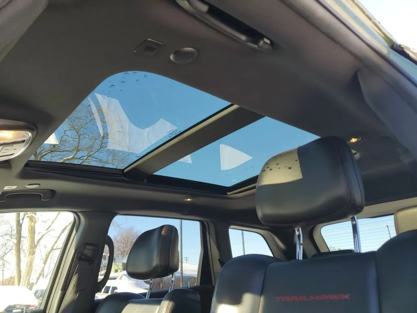 2021 /Black w/Ruby Red Accent Stitching Jeep Grand Cherokee Trailhawk (1C4RJFLG7MC) with an V6, 3.6L engine, 8-speed automatic transmission, located at 6064 Gull Rd, Kalamazoo, MI, 49048, (269) 222-0088, 42.328388, -85.512924 - **Conquer the Roads with the 2021 Jeep Grand Cherokee Trailhawk at AutoMaxx - Kalamazoo!**<br /> <br /> Are you ready to elevate your adventures? Whether you're navigating city streets or tackling rugged terrains for weekend escapades, the 2021 Jeep Grand Cherokee Trailhawk is your ticket to an exhi - Photo#17