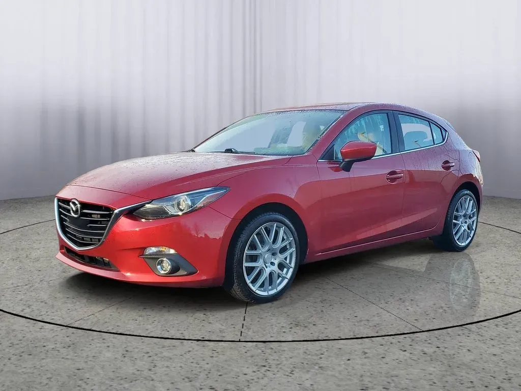 2014 /Almond Mazda Mazda3 s Grand Touring (JM1BM1M30E1) with an 4 Cyl, 2.5L engine, 6-speed automatic transmission, located at 6064 Gull Rd, Kalamazoo, MI, 49048, (269) 222-0088, 42.328388, -85.512924 - **Experience the Thrill of Driving with This 2014 Mazda3 Perfect for Your Active Lifestyle!**<br /> <br /> Are you ready to elevate your daily commute or weekend getaways? Look no further than this stunning 2014 Mazda3 s Grand Touring, a pre-owned gem waiting for its next adventure! With its sporty - Photo#2