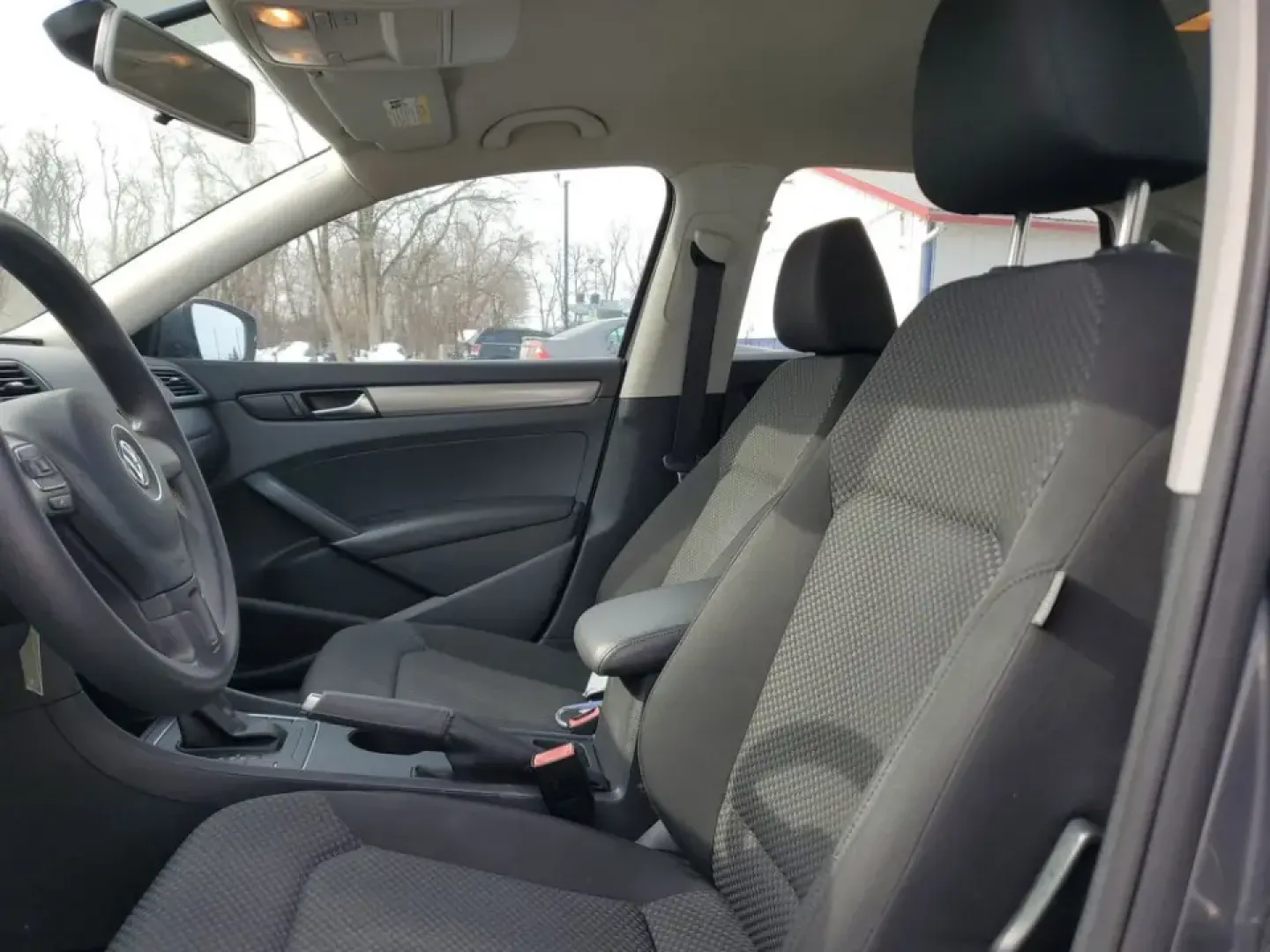 2014 /Titan Black Volkswagen Passat S (1VWAT7A33EC) with an 4 Cyl, 1.8L engine, 6-speed automatic transmission, located at 6064 Gull Rd, Kalamazoo, MI, 49048, (269) 222-0088, 42.328388, -85.512924 - Elevate your daily drive with the perfect blend of style, comfort, and efficiency! The 2014 Volkswagen Passat is an ideal sedan for anyone looking for a reliable and affordable ride, whether you're commuting through the bustling streets of Kalamazoo or embarking on weekend adventures with friends an- Photo#12