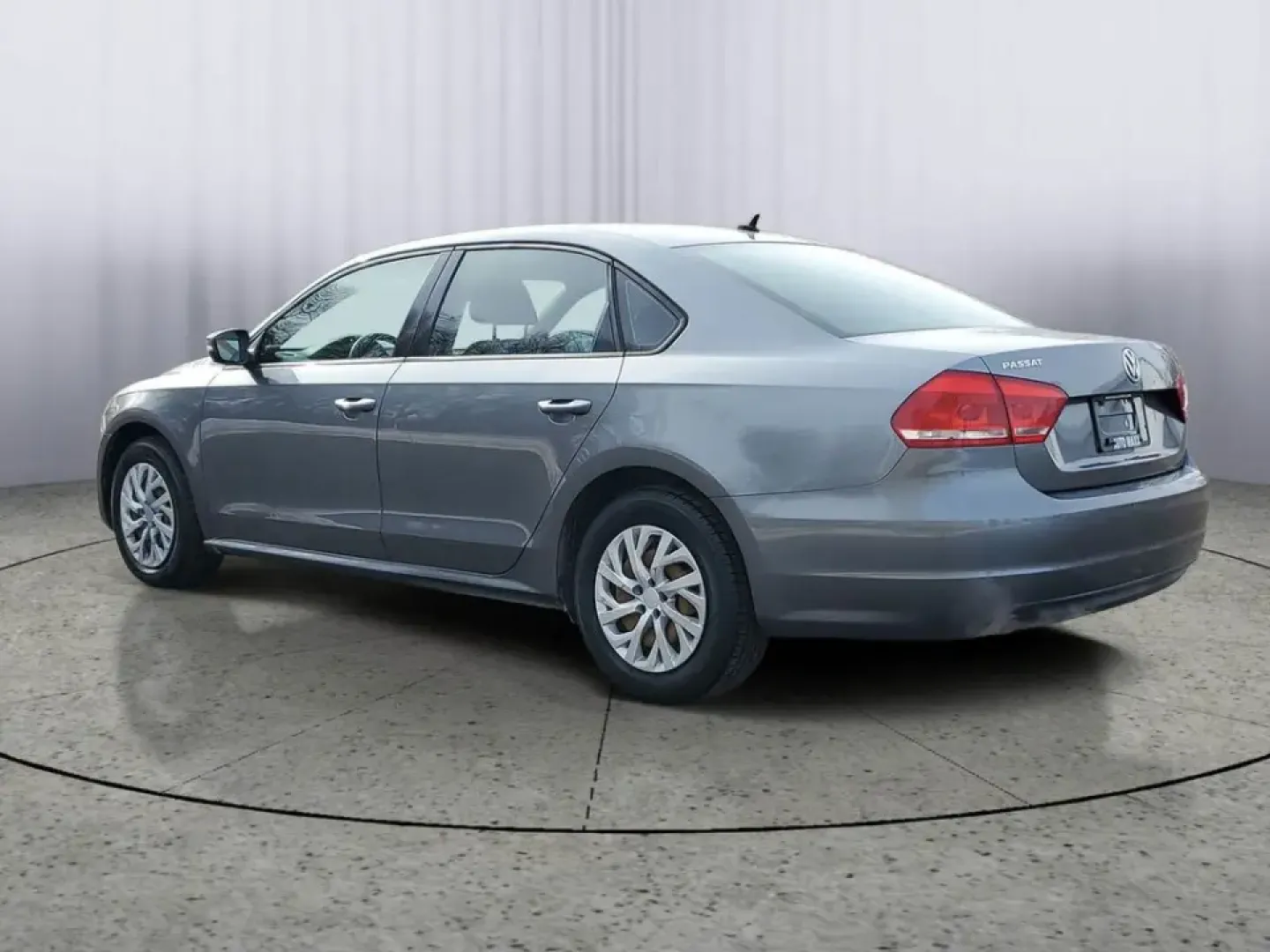 2014 /Titan Black Volkswagen Passat S (1VWAT7A33EC) with an 4 Cyl, 1.8L engine, 6-speed automatic transmission, located at 6064 Gull Rd, Kalamazoo, MI, 49048, (269) 222-0088, 42.328388, -85.512924 - Elevate your daily drive with the perfect blend of style, comfort, and efficiency! The 2014 Volkswagen Passat is an ideal sedan for anyone looking for a reliable and affordable ride, whether you're commuting through the bustling streets of Kalamazoo or embarking on weekend adventures with friends an- Photo#2