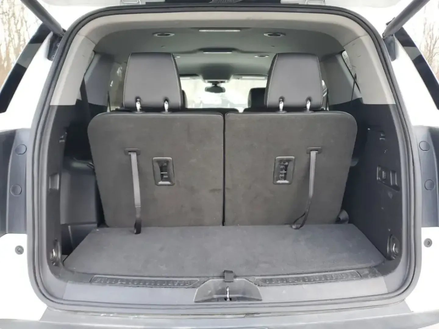 2023 /Jet Black GMC Acadia SLT (1GKKNML48PZ) with an 4 Cyl, 2.0L engine, 9-speed automatic transmission, located at 6064 Gull Rd, Kalamazoo, MI, 49048, (269) 222-0088, 42.328388, -85.512924 - Need a road-trip-ready SUV that can handle school drop-offs, long commutes across town, and weekend escapes to Lake Michigan without feeling cramped? This **2023 GMC Acadia SLT** delivers the comfort and tech families and busy professionals want, with three-row flexibility and a smooth, efficient tu - Photo#6