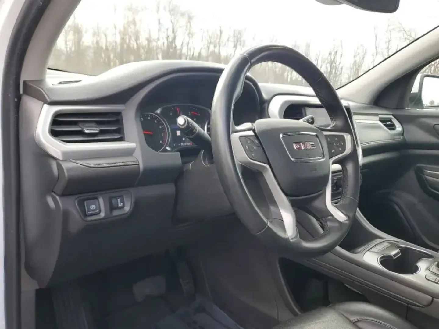 2023 /Jet Black GMC Acadia SLT (1GKKNML48PZ) with an 4 Cyl, 2.0L engine, 9-speed automatic transmission, located at 6064 Gull Rd, Kalamazoo, MI, 49048, (269) 222-0088, 42.328388, -85.512924 - Need a road-trip-ready SUV that can handle school drop-offs, long commutes across town, and weekend escapes to Lake Michigan without feeling cramped? This **2023 GMC Acadia SLT** delivers the comfort and tech families and busy professionals want, with three-row flexibility and a smooth, efficient tu - Photo#16
