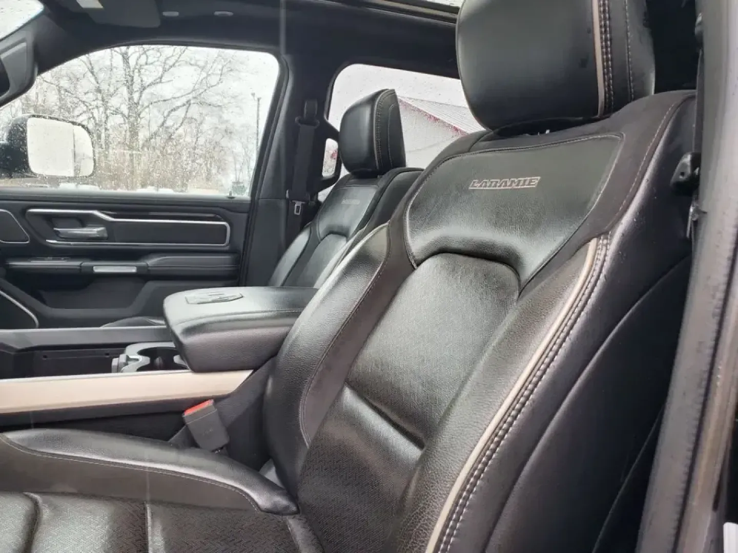 2019 /Black Ram 1500 Laramie (1C6SRFRT4KN) with an V8, 5.7L engine, 8-speed automatic transmission, located at 6064 Gull Rd, Kalamazoo, MI, 49048, (269) 222-0088, 42.328388, -85.512924 - Need a truck that can handle Michigan winters, weekend towing, and comfortable daily commuting from Kalamazoo to Portage or Battle Creek-without feeling like a bare-bones work rig? This 2019 Ram 1500 Laramie 4WD is built for real life: school runs, job sites, lake weekends, and long highway stretche - Photo#12