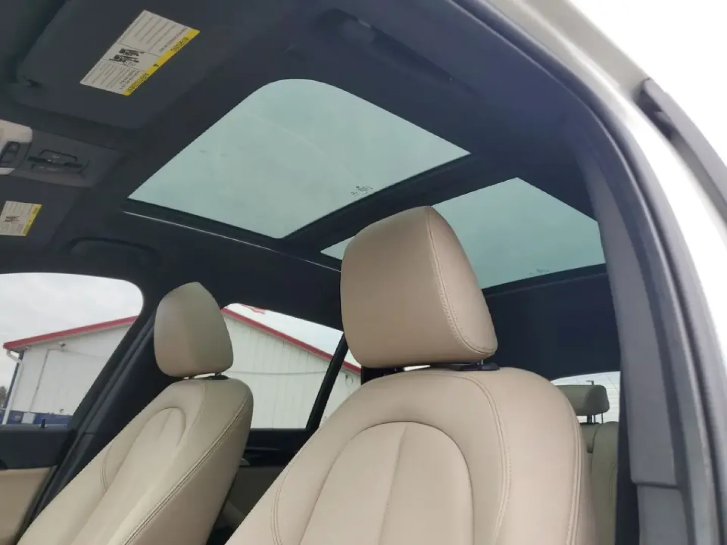 2021 /Oyster/Black BMW X1 sDrive28i (WBXJG7C07M5) with an 4 Cyl, 2.0L engine, 8-speed automatic transmission, located at 6064 Gull Rd, Kalamazoo, MI, 49048, (269) 222-0088, 42.328388, -85.512924 - Whether you're commuting daily between Kalamazoo and Portage, planning weekend getaways to South Haven, or simply want a premium SUV that's easy to park downtown near the Kalamazoo Mall, this 2021 BMW X1 sDrive28i is built for real life. It blends BMW performance with practical cargo space and moder- Photo#18