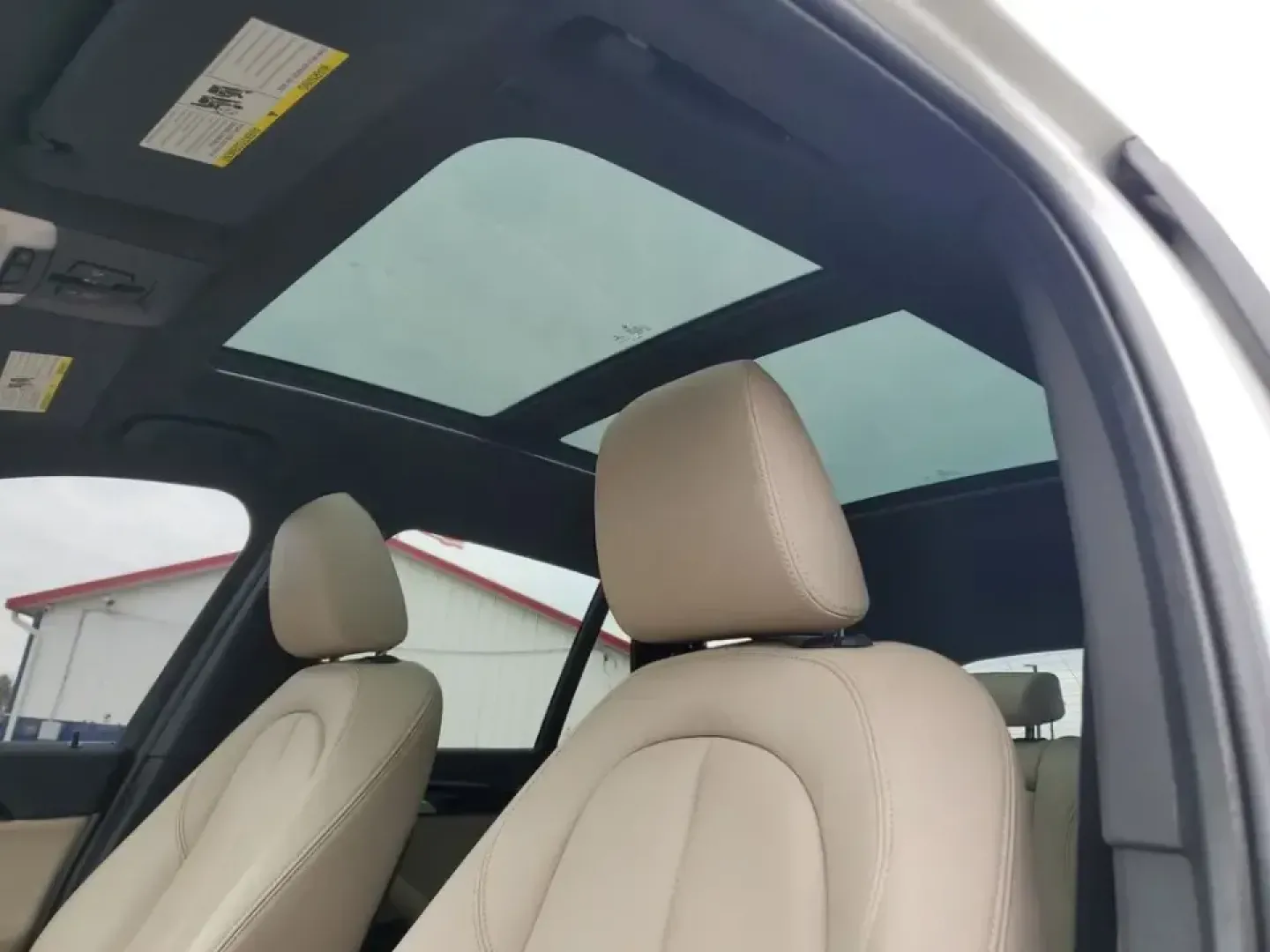 2021 /Oyster/Black BMW X1 sDrive28i (WBXJG7C07M5) with an 4 Cyl, 2.0L engine, 8-speed automatic transmission, located at 6064 Gull Rd, Kalamazoo, MI, 49048, (269) 222-0088, 42.328388, -85.512924 - Whether you're commuting daily between Kalamazoo and Portage, planning weekend getaways to South Haven, or simply want a premium SUV that's easy to park downtown near the Kalamazoo Mall, this 2021 BMW X1 sDrive28i is built for real life. It blends BMW performance with practical cargo space and moder - Photo#18