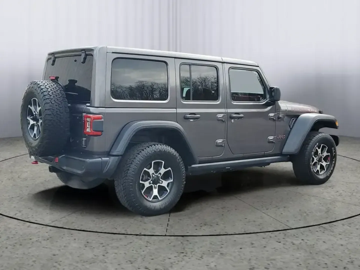 2021 /Black Jeep Wrangler Unlimited Rubicon (1C4HJXFN3MW) with an 4 Cyl, 2.0L engine, 8-speed automatic transmission, located at 6064 Gull Rd, Kalamazoo, MI, 49048, (269) 222-0088, 42.328388, -85.512924 - Whether your idea of a perfect weekend is a muddy two-track in the woods, a sunset cruise to Lake Michigan, or a snow-dusted commute across town, this 2021 Jeep Wrangler Unlimited Rubicon is built for the lifestyle that refuses to stay on pavement. With legendary Jeep capability, smart tech for ever - Photo#3