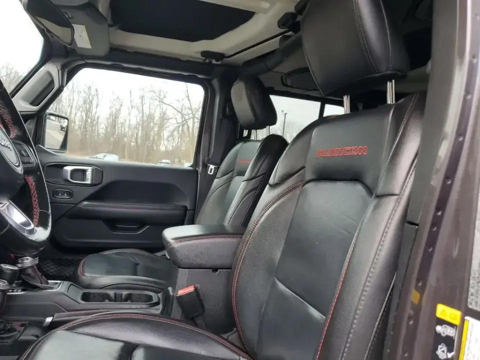 2021 /Black Jeep Wrangler Unlimited Rubicon (1C4HJXFN3MW) with an 4 Cyl, 2.0L engine, 8-speed automatic transmission, located at 6064 Gull Rd, Kalamazoo, MI, 49048, (269) 222-0088, 42.328388, -85.512924 - Whether your idea of a perfect weekend is a muddy two-track in the woods, a sunset cruise to Lake Michigan, or a snow-dusted commute across town, this 2021 Jeep Wrangler Unlimited Rubicon is built for the lifestyle that refuses to stay on pavement. With legendary Jeep capability, smart tech for ever - Photo#13