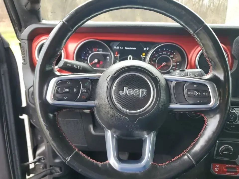 2021 /Black Jeep Wrangler Unlimited Rubicon (1C4HJXFN3MW) with an 4 Cyl, 2.0L engine, 8-speed automatic transmission, located at 6064 Gull Rd, Kalamazoo, MI, 49048, (269) 222-0088, 42.328388, -85.512924 - Whether your idea of a perfect weekend is a muddy two-track in the woods, a sunset cruise to Lake Michigan, or a snow-dusted commute across town, this 2021 Jeep Wrangler Unlimited Rubicon is built for the lifestyle that refuses to stay on pavement. With legendary Jeep capability, smart tech for ever - Photo#16