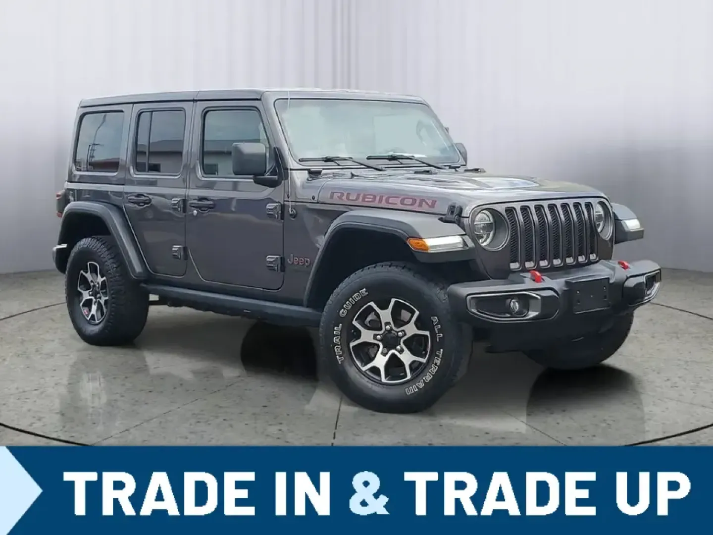 2021 /Black Jeep Wrangler Unlimited Rubicon (1C4HJXFN3MW) with an 4 Cyl, 2.0L engine, 8-speed automatic transmission, located at 6064 Gull Rd, Kalamazoo, MI, 49048, (269) 222-0088, 42.328388, -85.512924 - Whether your idea of a perfect weekend is a muddy two-track in the woods, a sunset cruise to Lake Michigan, or a snow-dusted commute across town, this 2021 Jeep Wrangler Unlimited Rubicon is built for the lifestyle that refuses to stay on pavement. With legendary Jeep capability, smart tech for ever - Photo#0