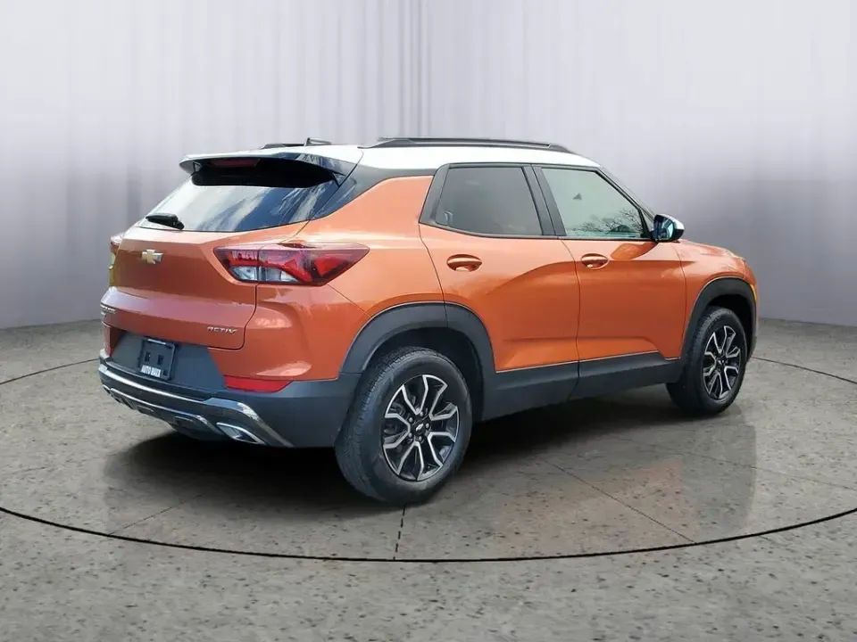 2023 /Jet Black w/Arizona Accents Chevrolet TrailBlazer ACTIV (KL79MSSL8PB) with an 3 Cyl, 1.3L engine, 9-speed automatic transmission, located at 6064 Gull Rd, Kalamazoo, MI, 49048, (269) 222-0088, 42.328388, -85.512924 - Pack up the gear, load the family, and point the nose toward a Michigan weekend-this 2023 Chevrolet TrailBlazer ACTIV AWD is the kind of small SUV that makes everyday commuting and spontaneous road trips feel effortless. With its bold Vivid Orange Metallic paint, confident stance, and adventure-read - Photo#3