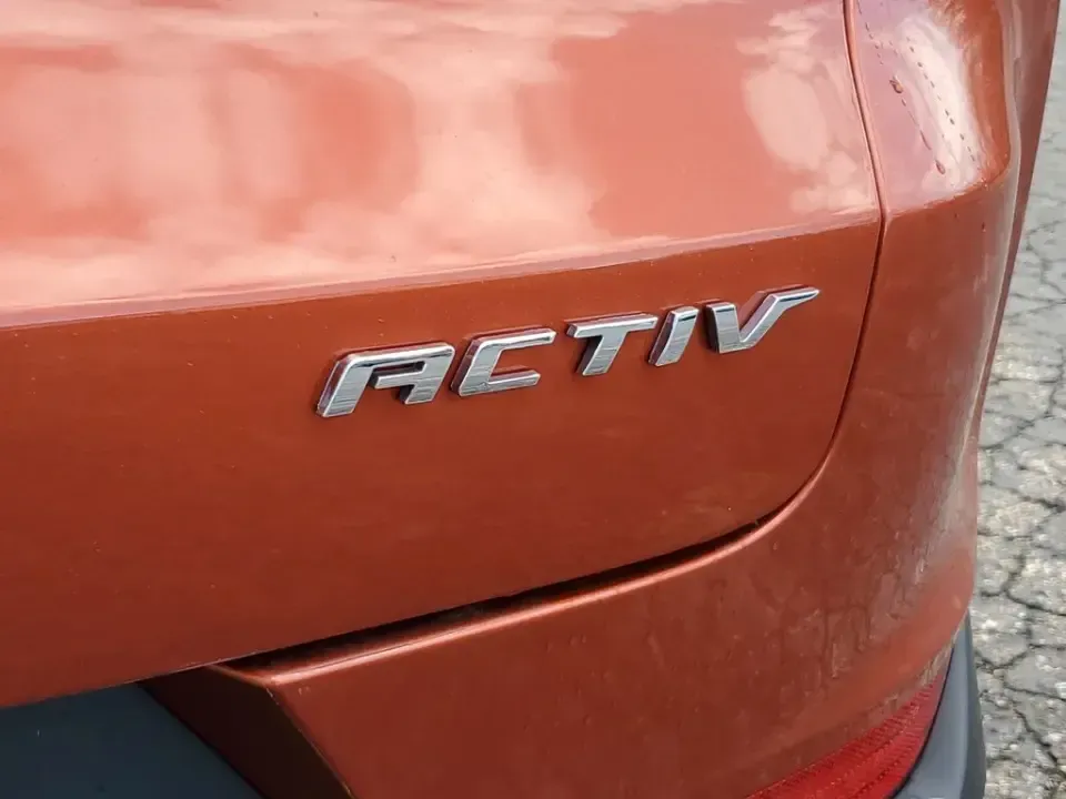 2023 /Jet Black w/Arizona Accents Chevrolet TrailBlazer ACTIV (KL79MSSL8PB) with an 3 Cyl, 1.3L engine, 9-speed automatic transmission, located at 6064 Gull Rd, Kalamazoo, MI, 49048, (269) 222-0088, 42.328388, -85.512924 - Pack up the gear, load the family, and point the nose toward a Michigan weekend-this 2023 Chevrolet TrailBlazer ACTIV AWD is the kind of small SUV that makes everyday commuting and spontaneous road trips feel effortless. With its bold Vivid Orange Metallic paint, confident stance, and adventure-read - Photo#6