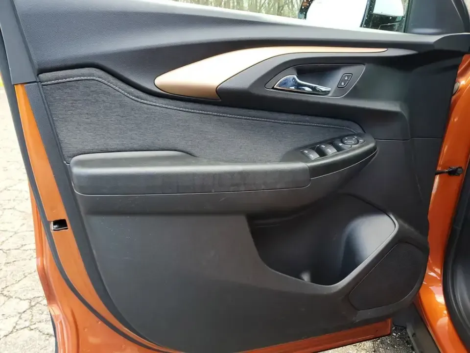 2023 /Jet Black w/Arizona Accents Chevrolet TrailBlazer ACTIV (KL79MSSL8PB) with an 3 Cyl, 1.3L engine, 9-speed automatic transmission, located at 6064 Gull Rd, Kalamazoo, MI, 49048, (269) 222-0088, 42.328388, -85.512924 - Pack up the gear, load the family, and point the nose toward a Michigan weekend-this 2023 Chevrolet TrailBlazer ACTIV AWD is the kind of small SUV that makes everyday commuting and spontaneous road trips feel effortless. With its bold Vivid Orange Metallic paint, confident stance, and adventure-read - Photo#11