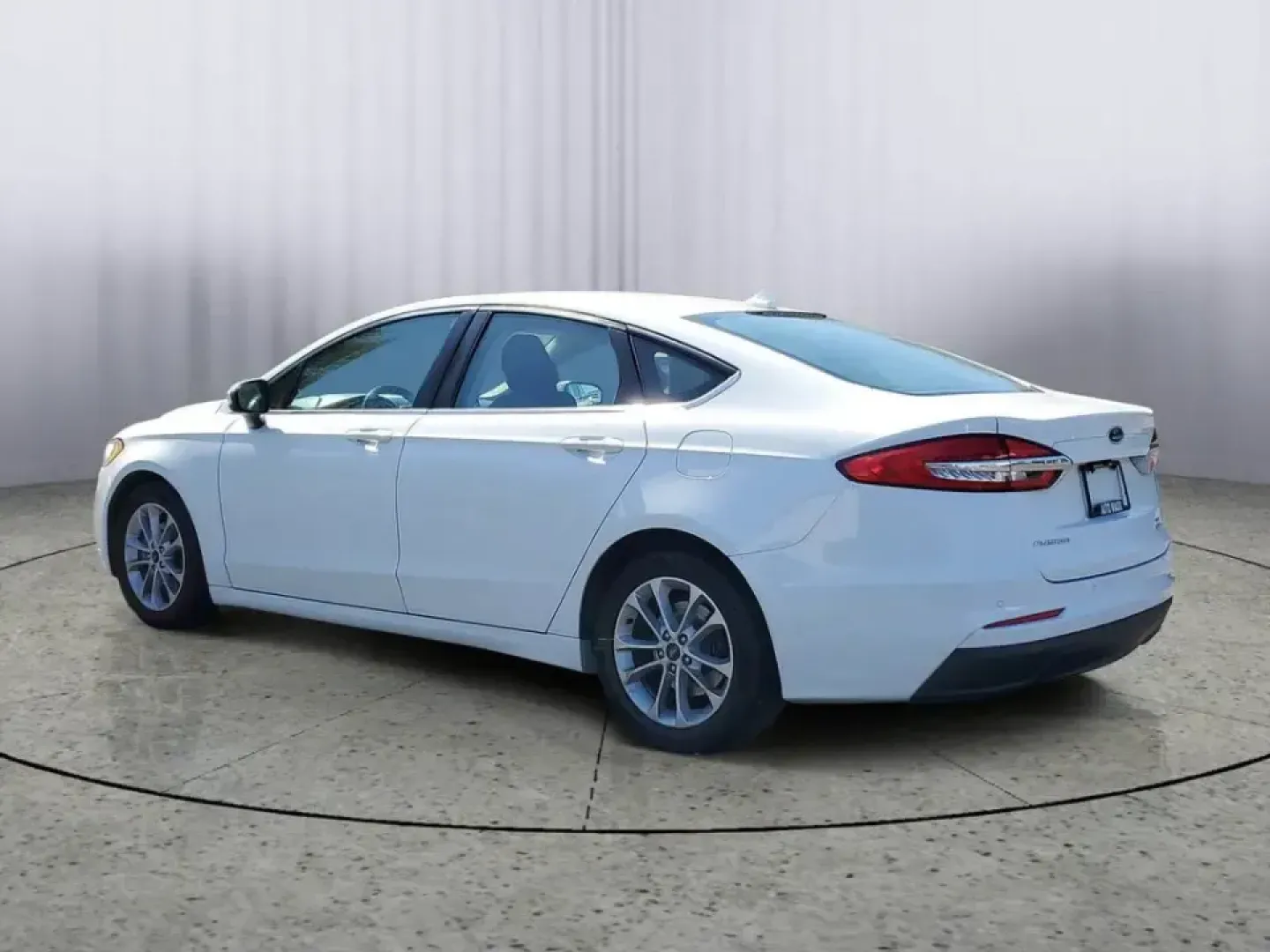 2020 /Ebony Ford Fusion SE (3FA6P0HD5LR) with an 4 Cyl, 1.5L engine, 6-speed automatic transmission, located at 6064 Gull Rd, Kalamazoo, MI, 49048, (269) 222-0088, 42.328388, -85.512924 - Need a smart, comfortable commuter that can handle the daily grind from Downtown Kalamazoo to Portage-then stretch its legs for a weekend run up Gull Road toward Gull Lake? This 2020 Ford Fusion SE is a practical, tech-forward sedan built for real life: long commutes, campus drop-offs, and road-trip - Photo#2