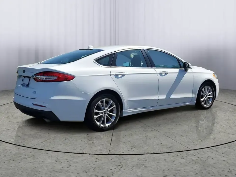 2020 /Ebony Ford Fusion SE (3FA6P0HD5LR) with an 4 Cyl, 1.5L engine, 6-speed automatic transmission, located at 6064 Gull Rd, Kalamazoo, MI, 49048, (269) 222-0088, 42.328388, -85.512924 - Need a smart, comfortable commuter that can handle the daily grind from Downtown Kalamazoo to Portage-then stretch its legs for a weekend run up Gull Road toward Gull Lake? This 2020 Ford Fusion SE is a practical, tech-forward sedan built for real life: long commutes, campus drop-offs, and road-trip - Photo#3