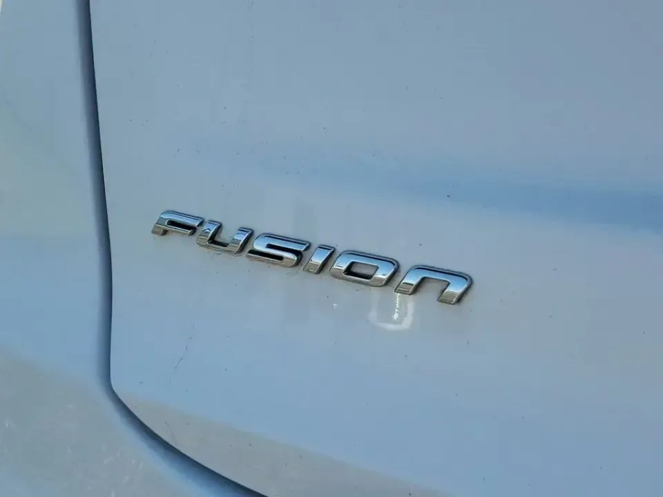 2020 /Ebony Ford Fusion SE (3FA6P0HD5LR) with an 4 Cyl, 1.5L engine, 6-speed automatic transmission, located at 6064 Gull Rd, Kalamazoo, MI, 49048, (269) 222-0088, 42.328388, -85.512924 - Need a smart, comfortable commuter that can handle the daily grind from Downtown Kalamazoo to Portage-then stretch its legs for a weekend run up Gull Road toward Gull Lake? This 2020 Ford Fusion SE is a practical, tech-forward sedan built for real life: long commutes, campus drop-offs, and road-trip - Photo#5