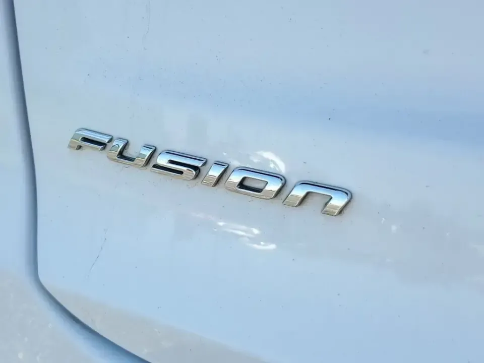 2020 /Ebony Ford Fusion SE (3FA6P0HD5LR) with an 4 Cyl, 1.5L engine, 6-speed automatic transmission, located at 6064 Gull Rd, Kalamazoo, MI, 49048, (269) 222-0088, 42.328388, -85.512924 - Need a smart, comfortable commuter that can handle the daily grind from Downtown Kalamazoo to Portage-then stretch its legs for a weekend run up Gull Road toward Gull Lake? This 2020 Ford Fusion SE is a practical, tech-forward sedan built for real life: long commutes, campus drop-offs, and road-trip - Photo#6