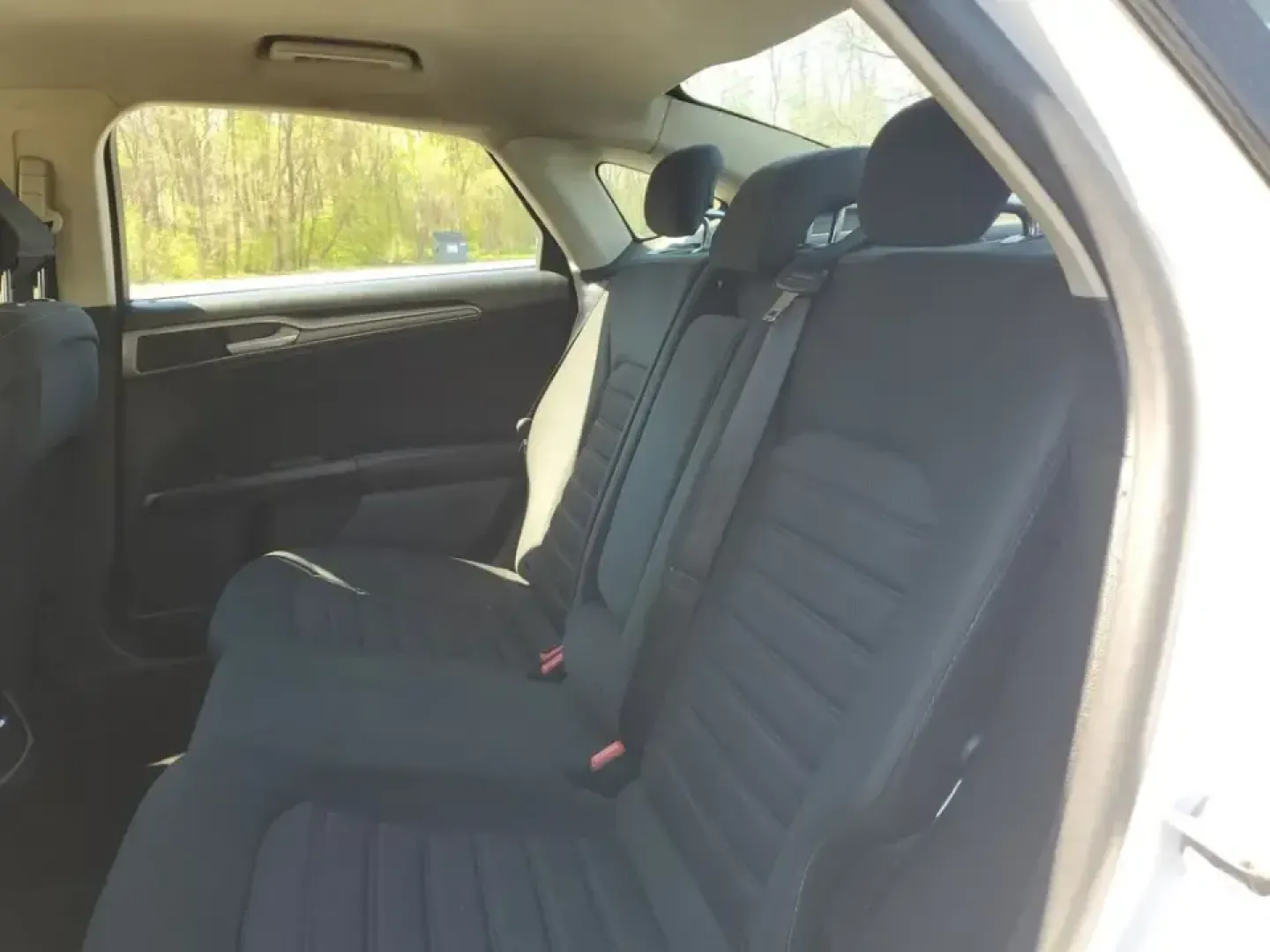 2020 /Ebony Ford Fusion SE (3FA6P0HD5LR) with an 4 Cyl, 1.5L engine, 6-speed automatic transmission, located at 6064 Gull Rd, Kalamazoo, MI, 49048, (269) 222-0088, 42.328388, -85.512924 - Need a smart, comfortable commuter that can handle the daily grind from Downtown Kalamazoo to Portage-then stretch its legs for a weekend run up Gull Road toward Gull Lake? This 2020 Ford Fusion SE is a practical, tech-forward sedan built for real life: long commutes, campus drop-offs, and road-trip - Photo#9