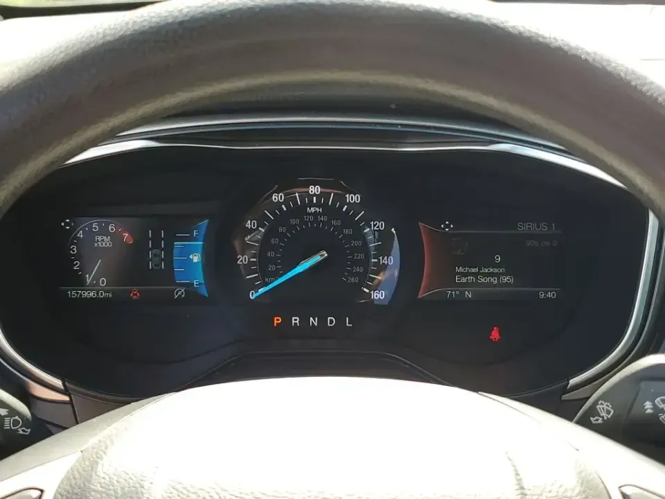 2020 /Ebony Ford Fusion SE (3FA6P0HD5LR) with an 4 Cyl, 1.5L engine, 6-speed automatic transmission, located at 6064 Gull Rd, Kalamazoo, MI, 49048, (269) 222-0088, 42.328388, -85.512924 - Need a smart, comfortable commuter that can handle the daily grind from Downtown Kalamazoo to Portage-then stretch its legs for a weekend run up Gull Road toward Gull Lake? This 2020 Ford Fusion SE is a practical, tech-forward sedan built for real life: long commutes, campus drop-offs, and road-trip - Photo#21