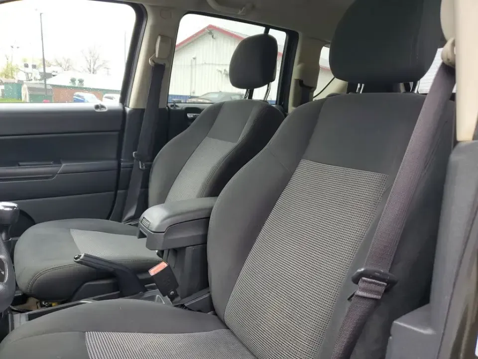 2015 /Dark Slate Gray Jeep Compass Sport (1C4NJDBB8FD) with an 4 Cyl, 2.4L engine, 5-speed manual transmission, located at 6064 Gull Rd, Kalamazoo, MI, 49048, (269) 222-0088, 42.328388, -85.512924 - Weekend trailheads, snowy commutes, and spontaneous road trips up to Lake Michigan all get easier when you've got a compact SUV that's ready for real life. This **2015 Jeep Compass Sport 4WD** is built for drivers who want everyday practicality with the confidence to handle Michigan weather-whether - Photo#11