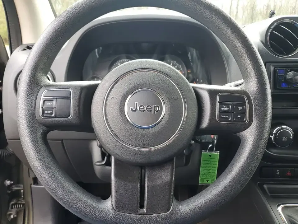 2015 /Dark Slate Gray Jeep Compass Sport (1C4NJDBB8FD) with an 4 Cyl, 2.4L engine, 5-speed manual transmission, located at 6064 Gull Rd, Kalamazoo, MI, 49048, (269) 222-0088, 42.328388, -85.512924 - Weekend trailheads, snowy commutes, and spontaneous road trips up to Lake Michigan all get easier when you've got a compact SUV that's ready for real life. This **2015 Jeep Compass Sport 4WD** is built for drivers who want everyday practicality with the confidence to handle Michigan weather-whether - Photo#13