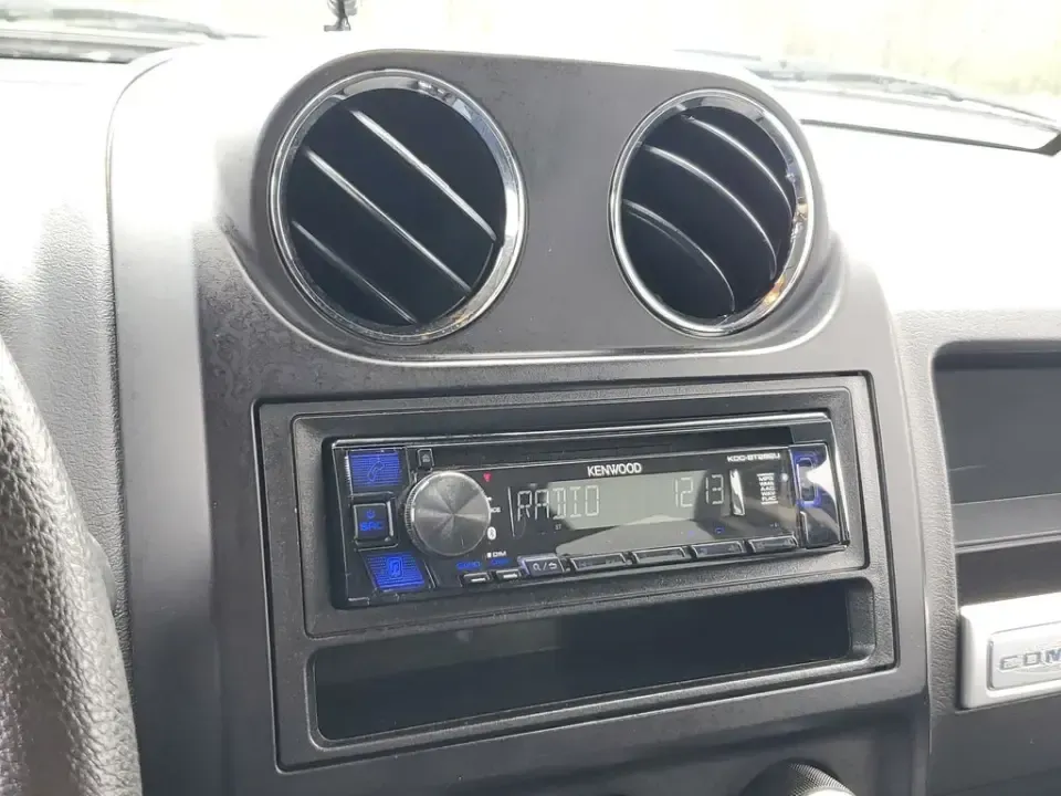 2015 /Dark Slate Gray Jeep Compass Sport (1C4NJDBB8FD) with an 4 Cyl, 2.4L engine, 5-speed manual transmission, located at 6064 Gull Rd, Kalamazoo, MI, 49048, (269) 222-0088, 42.328388, -85.512924 - Weekend trailheads, snowy commutes, and spontaneous road trips up to Lake Michigan all get easier when you've got a compact SUV that's ready for real life. This **2015 Jeep Compass Sport 4WD** is built for drivers who want everyday practicality with the confidence to handle Michigan weather-whether - Photo#17