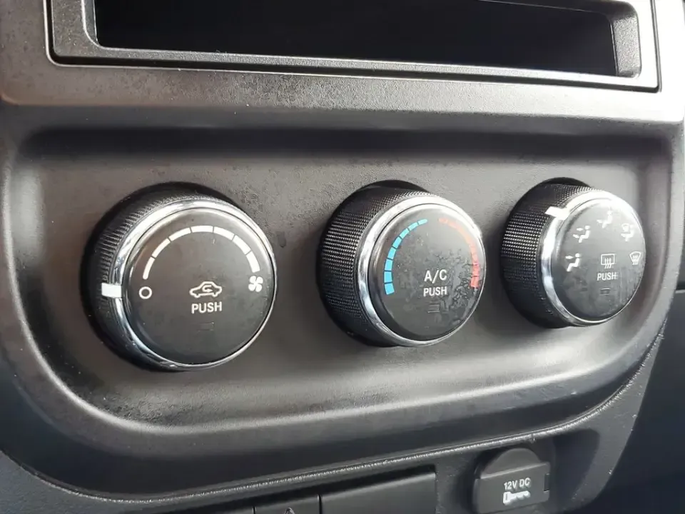 2015 /Dark Slate Gray Jeep Compass Sport (1C4NJDBB8FD) with an 4 Cyl, 2.4L engine, 5-speed manual transmission, located at 6064 Gull Rd, Kalamazoo, MI, 49048, (269) 222-0088, 42.328388, -85.512924 - Weekend trailheads, snowy commutes, and spontaneous road trips up to Lake Michigan all get easier when you've got a compact SUV that's ready for real life. This **2015 Jeep Compass Sport 4WD** is built for drivers who want everyday practicality with the confidence to handle Michigan weather-whether - Photo#18